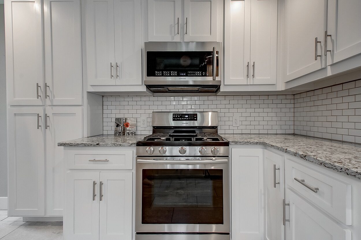 4608 Lafayette Avenue, Fort Worth, TX 76107 - Seller 18 Kitchen range and cabinet storage at 4608 Lafayette Avenue