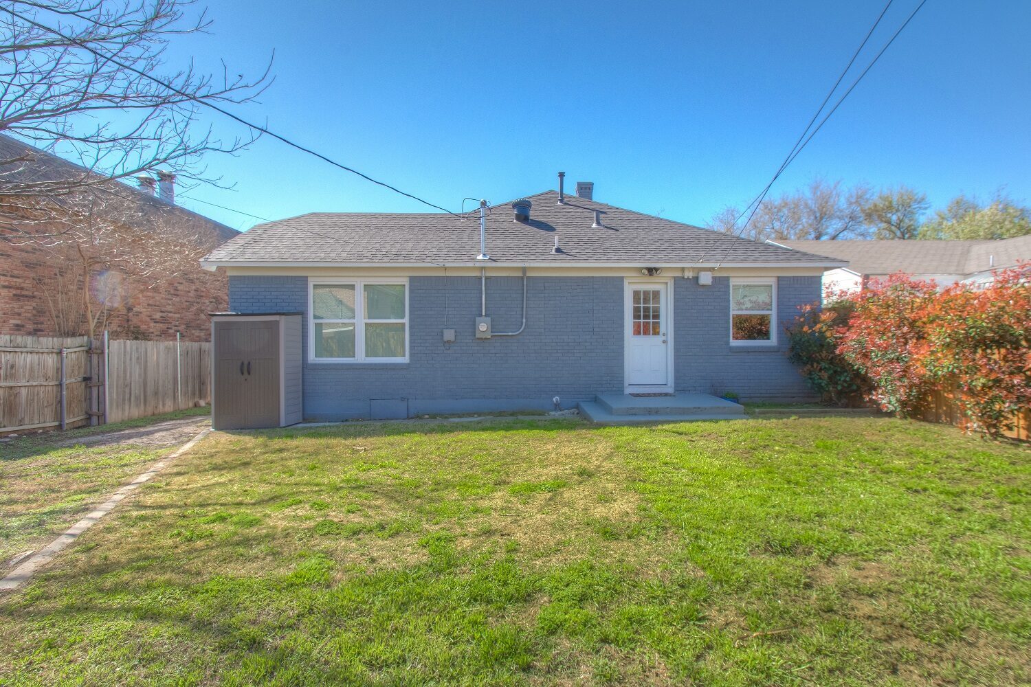 4608 Lafayette Avenue, Fort Worth, TX 76107 - Seller 34 Rear exterior across the lawn at 4608 Lafayette Avenue